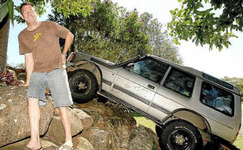 Gary Biggs has a unique way of parking his Land-Rover. 